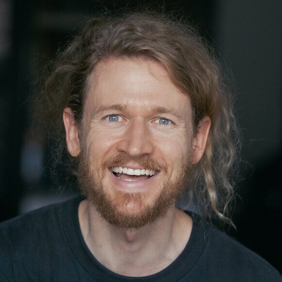Alex McKee, worship director at Orchard Church in Los Angeles, CA, smiling